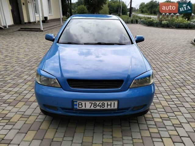 Синий Опель Астра, объемом двигателя 1.8 л и пробегом 290 тыс. км за 4100 $, фото 4 на Automoto.ua