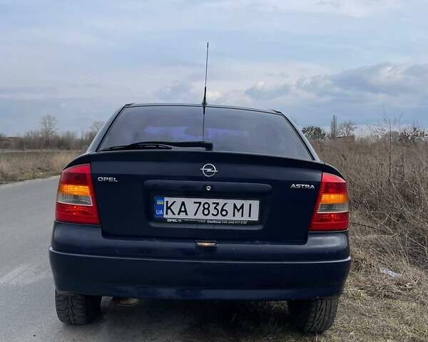 Синий Опель Астра, объемом двигателя 1.2 л и пробегом 469 тыс. км за 2200 $, фото 1 на Automoto.ua