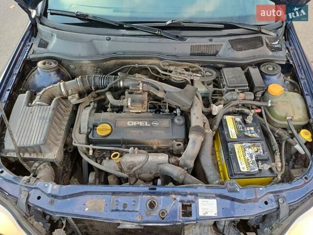 Синий Опель Астра, объемом двигателя 1.7 л и пробегом 310 тыс. км за 2300 $, фото 21 на Automoto.ua