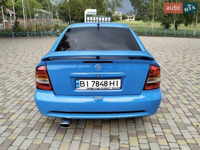 Синий Опель Астра, объемом двигателя 1.8 л и пробегом 290 тыс. км за 4100 $, фото 3 на Automoto.ua