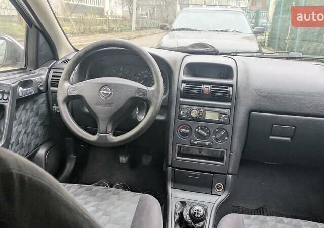Синій Опель Астра, об'ємом двигуна 1.7 л та пробігом 310 тис. км за 2300 $, фото 6 на Automoto.ua