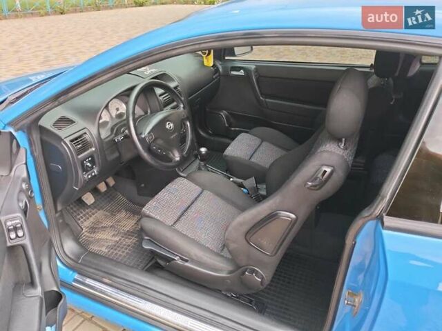 Синий Опель Астра, объемом двигателя 1.8 л и пробегом 290 тыс. км за 4100 $, фото 12 на Automoto.ua