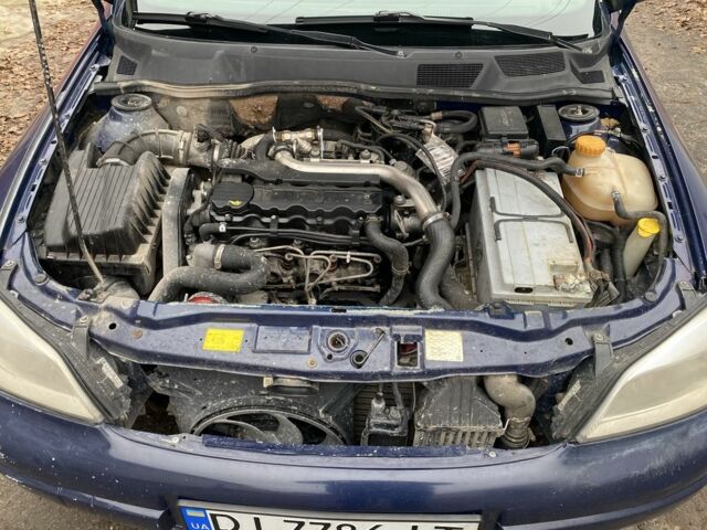 Синий Опель Астра, объемом двигателя 1.7 л и пробегом 200 тыс. км за 1500 $, фото 7 на Automoto.ua