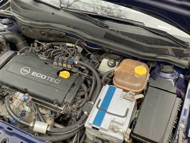 Синий Опель Астра, объемом двигателя 1.6 л и пробегом 203 тыс. км за 5800 $, фото 3 на Automoto.ua