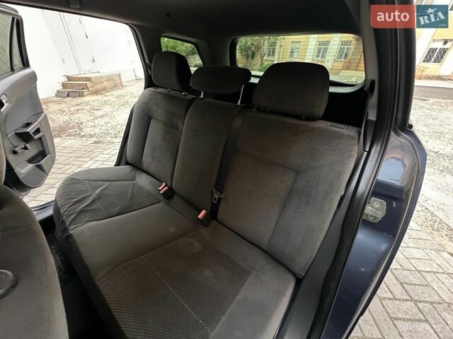 Синій Опель Астра, об'ємом двигуна 1.36 л та пробігом 260 тис. км за 4999 $, фото 26 на Automoto.ua