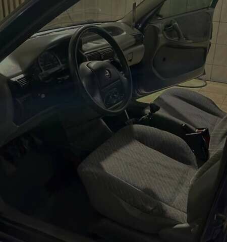 Синий Опель Астра, объемом двигателя 1.4 л и пробегом 300 тыс. км за 1400 $, фото 9 на Automoto.ua