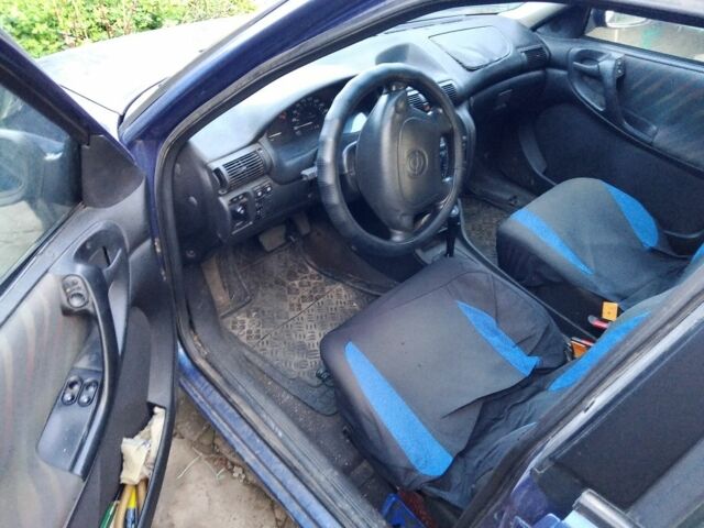 Синій Опель Астра, об'ємом двигуна 1.6 л та пробігом 300 тис. км за 1450 $, фото 4 на Automoto.ua