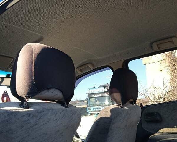 Синий Опель Астра, объемом двигателя 1.6 л и пробегом 350 тыс. км за 2300 $, фото 6 на Automoto.ua