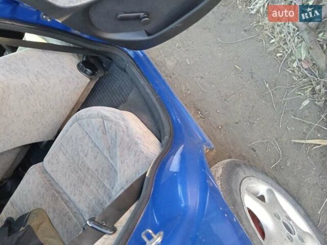 Синий Опель Астра, объемом двигателя 1.6 л и пробегом 350 тыс. км за 2300 $, фото 1 на Automoto.ua