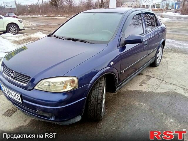 Синий Опель Астра, объемом двигателя 2 л и пробегом 220 тыс. км за 3250 $, фото 1 на Automoto.ua