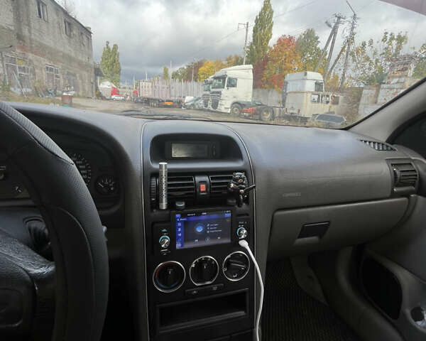 Синий Опель Астра, объемом двигателя 1.4 л и пробегом 346 тыс. км за 3200 $, фото 7 на Automoto.ua