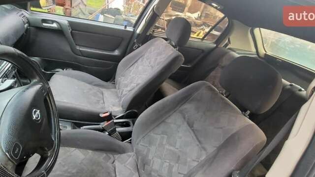 Синий Опель Астра, объемом двигателя 1.6 л и пробегом 800 тыс. км за 1200 $, фото 3 на Automoto.ua