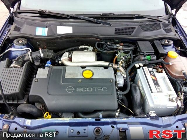 Синий Опель Астра, объемом двигателя 2 л и пробегом 220 тыс. км за 3250 $, фото 9 на Automoto.ua