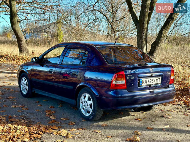 Синій Опель Астра, об'ємом двигуна 1.8 л та пробігом 220 тис. км за 3600 $, фото 6 на Automoto.ua