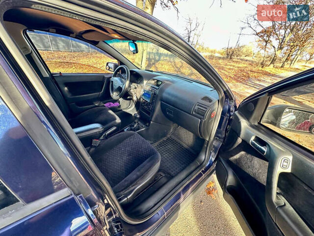 Синій Опель Астра, об'ємом двигуна 1.8 л та пробігом 220 тис. км за 3600 $, фото 16 на Automoto.ua