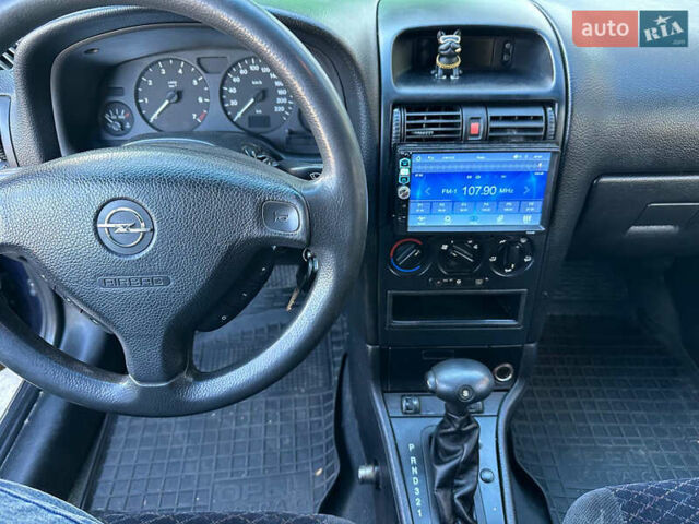 Синій Опель Астра, об'ємом двигуна 1.8 л та пробігом 220 тис. км за 3600 $, фото 13 на Automoto.ua