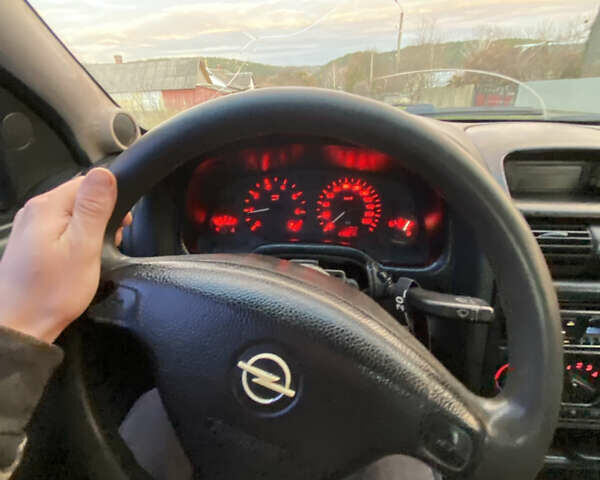 Синий Опель Астра, объемом двигателя 1.39 л и пробегом 243 тыс. км за 2500 $, фото 3 на Automoto.ua