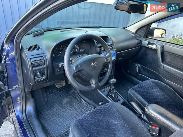Синій Опель Астра, об'ємом двигуна 1.8 л та пробігом 220 тис. км за 3600 $, фото 14 на Automoto.ua