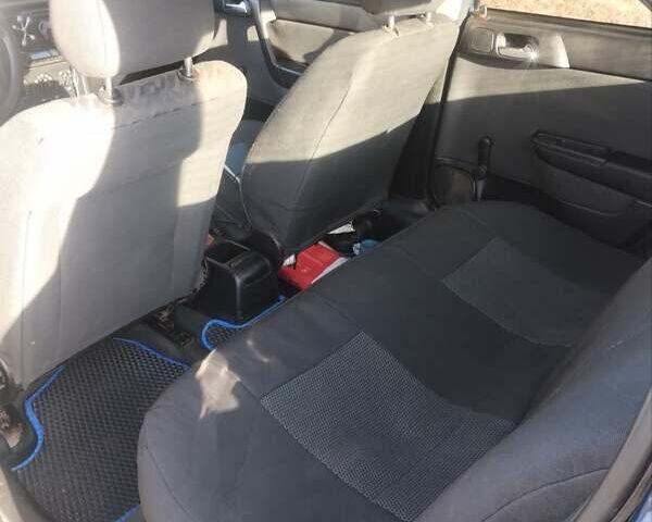 Синий Опель Астра, объемом двигателя 1.4 л и пробегом 270 тыс. км за 2900 $, фото 5 на Automoto.ua