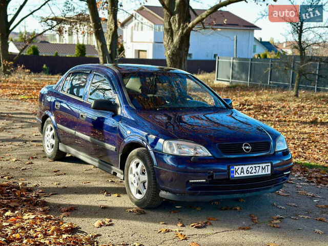 Синій Опель Астра, об'ємом двигуна 1.8 л та пробігом 220 тис. км за 3600 $, фото 10 на Automoto.ua