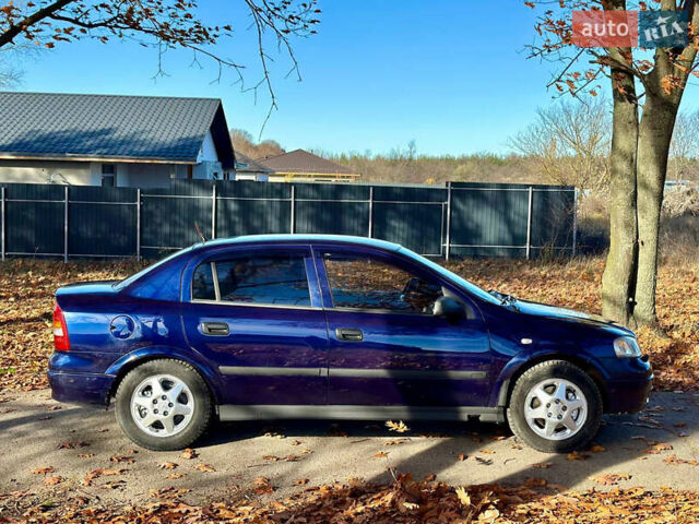 Синій Опель Астра, об'ємом двигуна 1.8 л та пробігом 220 тис. км за 3600 $, фото 9 на Automoto.ua