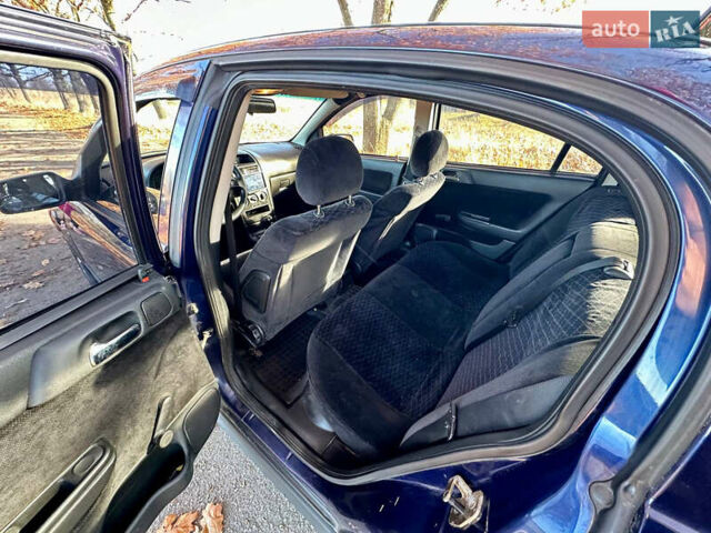 Синій Опель Астра, об'ємом двигуна 1.8 л та пробігом 220 тис. км за 3600 $, фото 17 на Automoto.ua