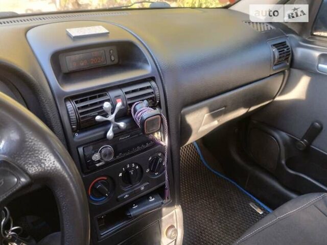 Синий Опель Астра, объемом двигателя 1.4 л и пробегом 270 тыс. км за 2900 $, фото 6 на Automoto.ua