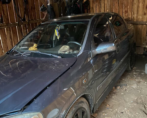 Синий Опель Астра, объемом двигателя 1.39 л и пробегом 243 тыс. км за 2500 $, фото 2 на Automoto.ua