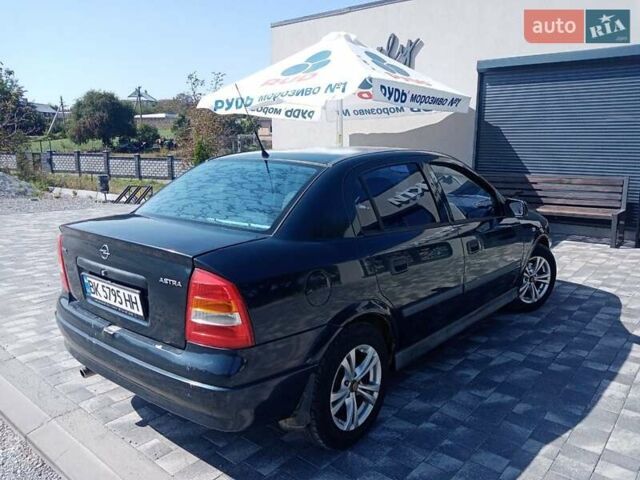 Синий Опель Астра, объемом двигателя 2.2 л и пробегом 299 тыс. км за 2650 $, фото 1 на Automoto.ua