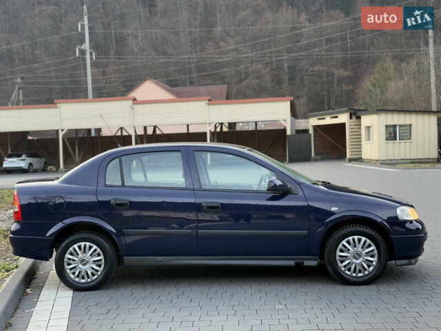 Синий Опель Астра, объемом двигателя 1.4 л и пробегом 170 тыс. км за 3650 $, фото 24 на Automoto.ua