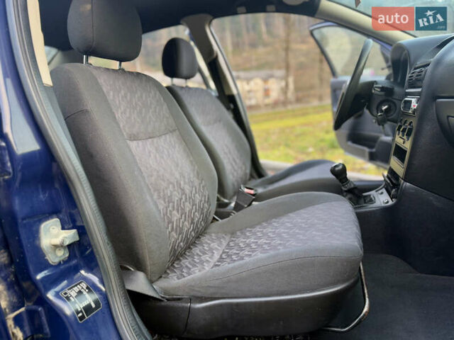 Синий Опель Астра, объемом двигателя 1.4 л и пробегом 170 тыс. км за 3650 $, фото 50 на Automoto.ua