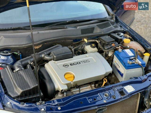 Синий Опель Астра, объемом двигателя 1.4 л и пробегом 170 тыс. км за 3650 $, фото 68 на Automoto.ua