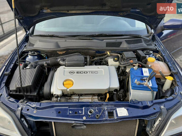 Синий Опель Астра, объемом двигателя 1.4 л и пробегом 170 тыс. км за 3650 $, фото 60 на Automoto.ua