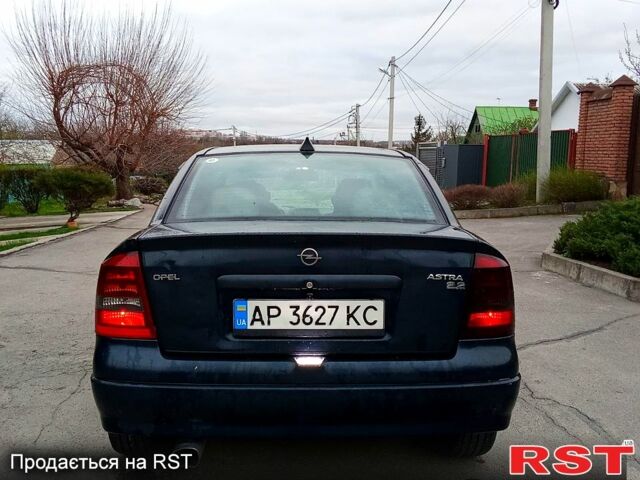 Синий Опель Астра, объемом двигателя 2.2 л и пробегом 300 тыс. км за 2850 $, фото 6 на Automoto.ua