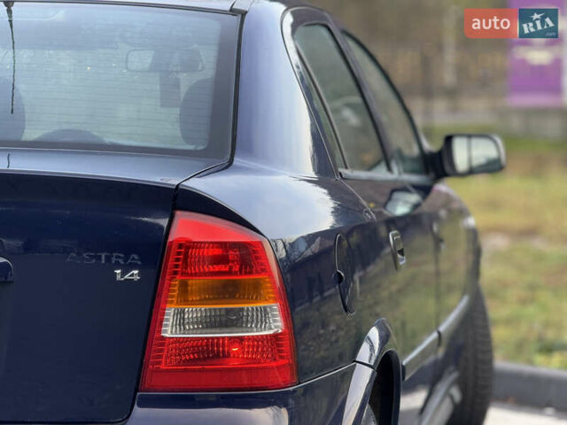 Синий Опель Астра, объемом двигателя 1.4 л и пробегом 170 тыс. км за 3650 $, фото 35 на Automoto.ua
