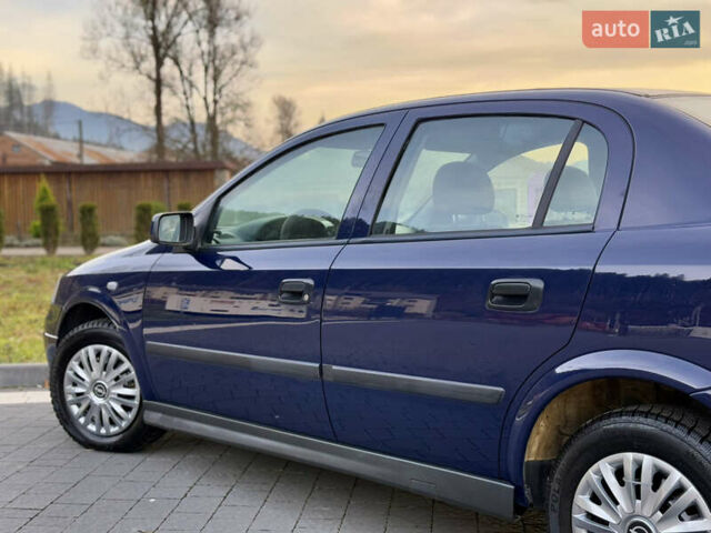 Синий Опель Астра, объемом двигателя 1.4 л и пробегом 170 тыс. км за 3650 $, фото 34 на Automoto.ua