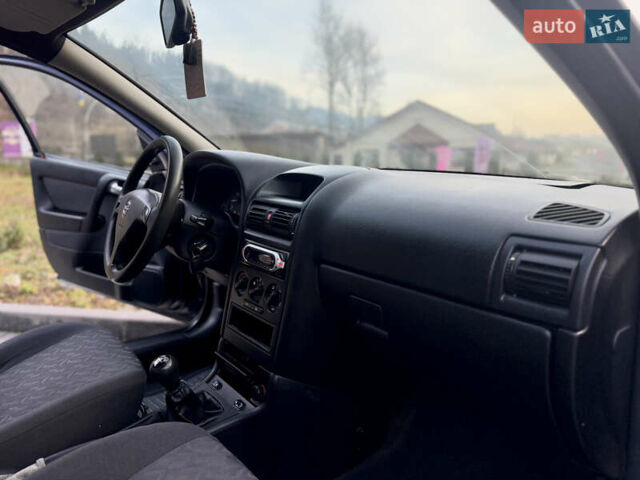 Синий Опель Астра, объемом двигателя 1.4 л и пробегом 170 тыс. км за 3650 $, фото 52 на Automoto.ua