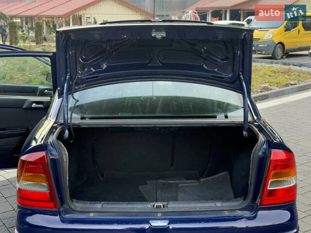 Синий Опель Астра, объемом двигателя 1.4 л и пробегом 170 тыс. км за 3650 $, фото 48 на Automoto.ua