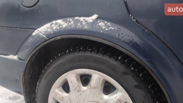 Синий Опель Астра, объемом двигателя 1.2 л и пробегом 265 тыс. км за 2850 $, фото 10 на Automoto.ua