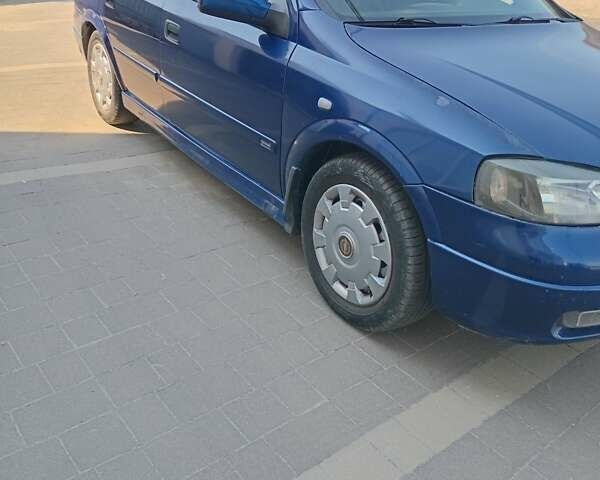 Синий Опель Астра, объемом двигателя 1.6 л и пробегом 225 тыс. км за 2999 $, фото 5 на Automoto.ua