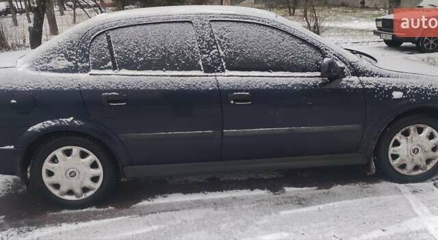 Синий Опель Астра, объемом двигателя 1.2 л и пробегом 265 тыс. км за 2850 $, фото 3 на Automoto.ua