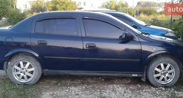Синій Опель Астра, об'ємом двигуна 1.6 л та пробігом 243 тис. км за 4345 $, фото 9 на Automoto.ua