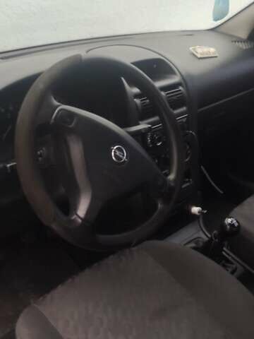 Синий Опель Астра, объемом двигателя 1.2 л и пробегом 265 тыс. км за 2850 $, фото 5 на Automoto.ua