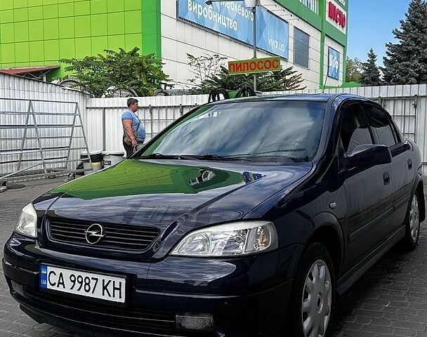 Синий Опель Астра, объемом двигателя 1.6 л и пробегом 159 тыс. км за 4150 $, фото 3 на Automoto.ua