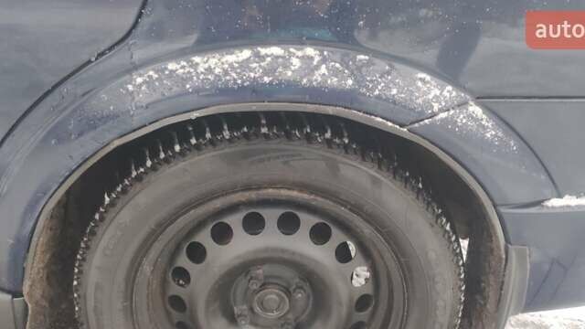 Синий Опель Астра, объемом двигателя 1.2 л и пробегом 265 тыс. км за 2850 $, фото 9 на Automoto.ua