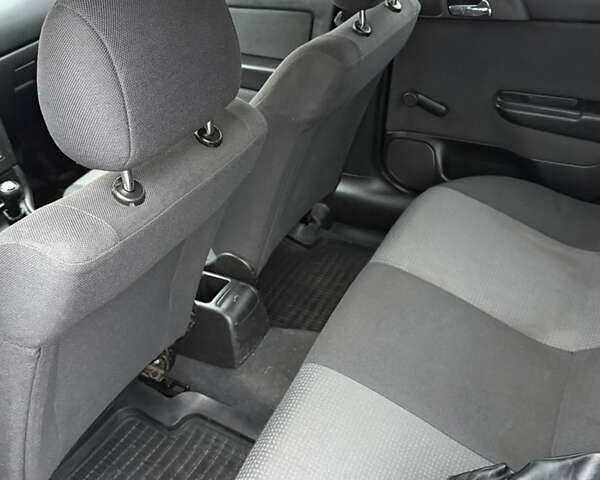 Синий Опель Астра, объемом двигателя 1.39 л и пробегом 210 тыс. км за 3299 $, фото 18 на Automoto.ua