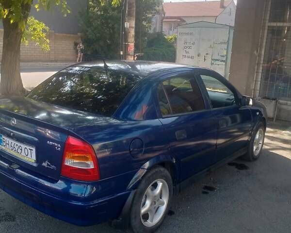 Синий Опель Астра, объемом двигателя 1.4 л и пробегом 180 тыс. км за 3200 $, фото 1 на Automoto.ua