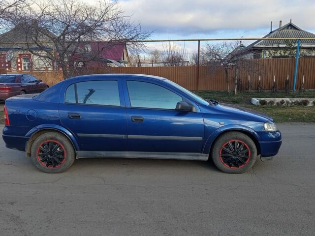 Синий Опель Астра, объемом двигателя 1.6 л и пробегом 365 тыс. км за 3000 $, фото 3 на Automoto.ua