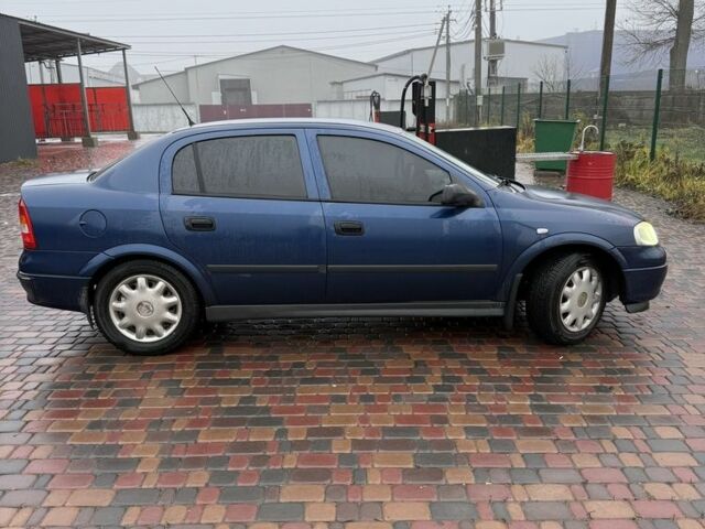 Синий Опель Астра, объемом двигателя 1.4 л и пробегом 210 тыс. км за 3300 $, фото 1 на Automoto.ua