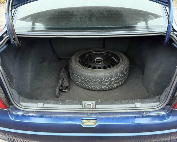 Синий Опель Астра, объемом двигателя 1.39 л и пробегом 210 тыс. км за 3299 $, фото 13 на Automoto.ua